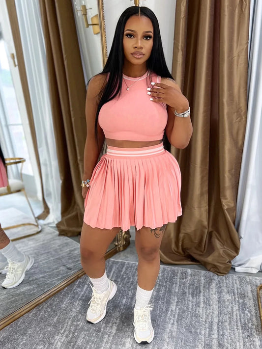 Sleeveless crop top + Pleated skirt