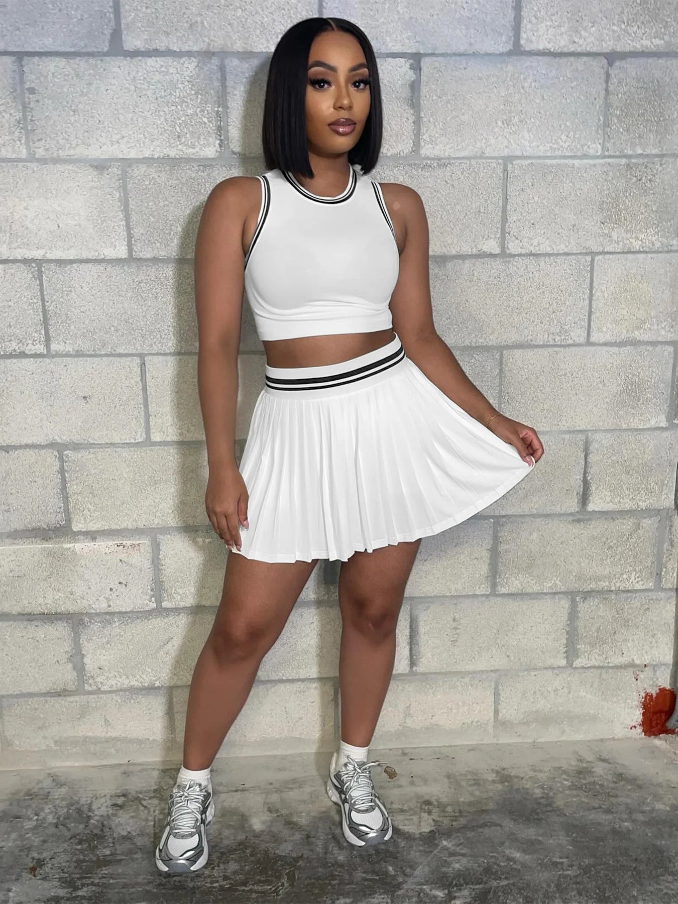 Sleeveless crop top + Pleated skirt